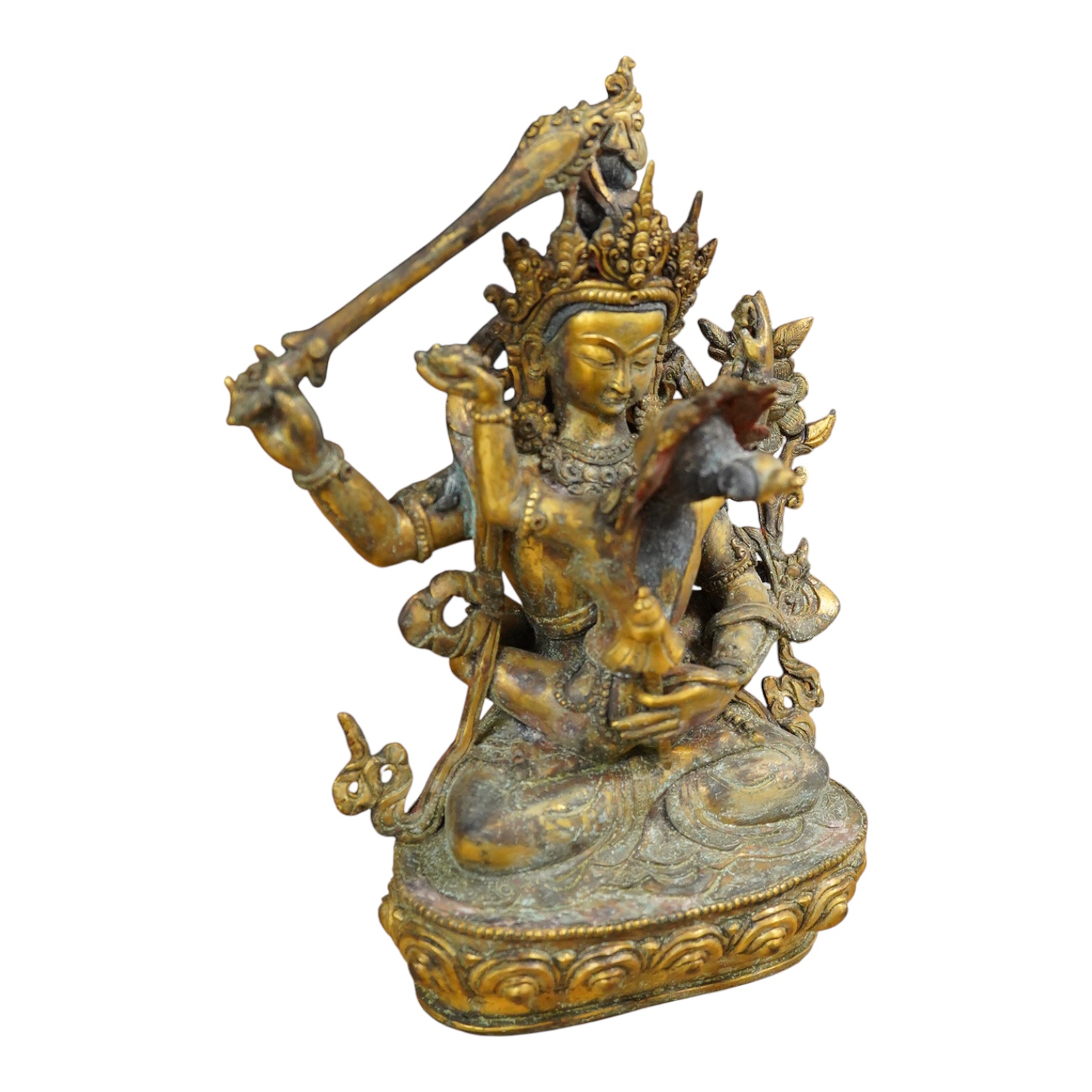 A Sino Tibetan gilt bronze group of Mahakala and consort, 22cm high